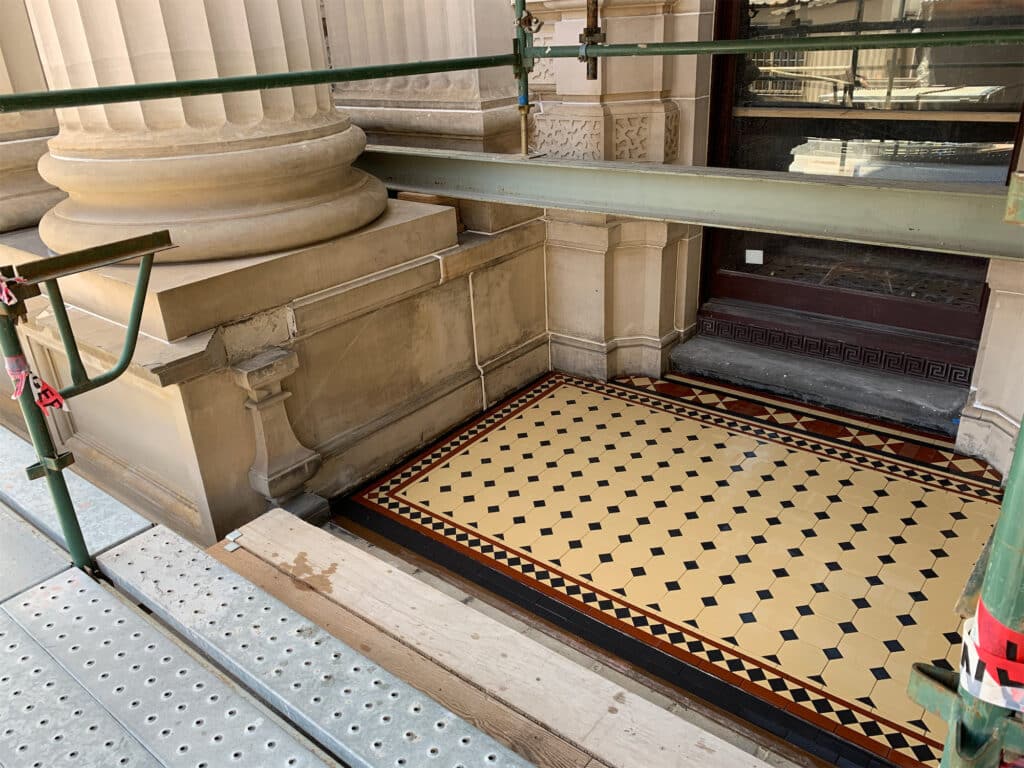 Restored patterned floor tiles