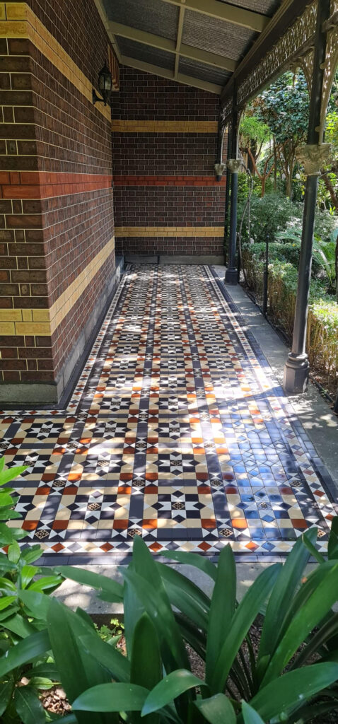 ornate tiled porch pathway