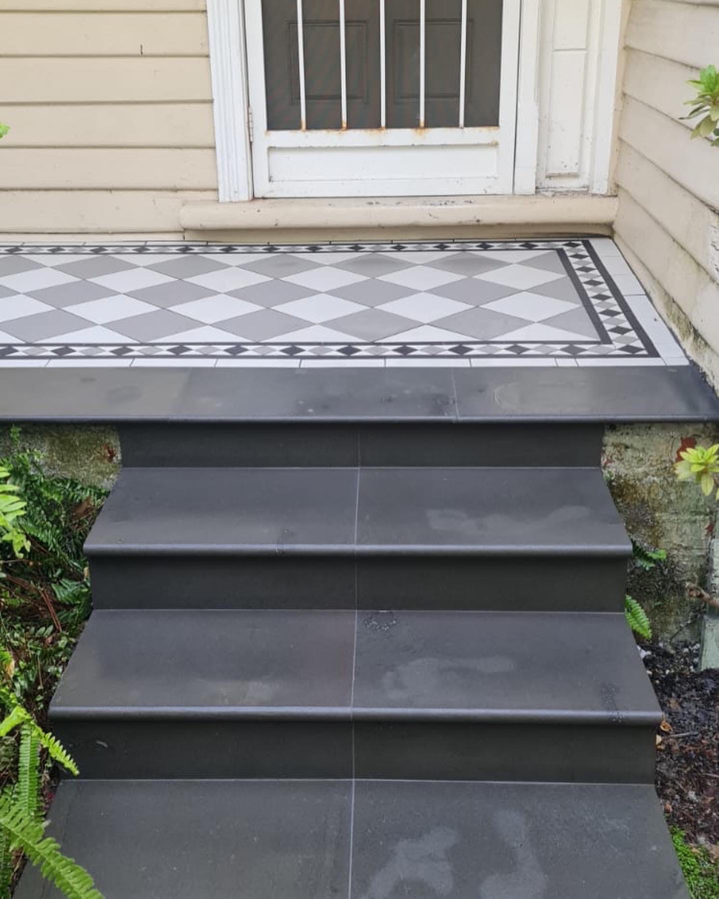 Dark tiled steps leading home