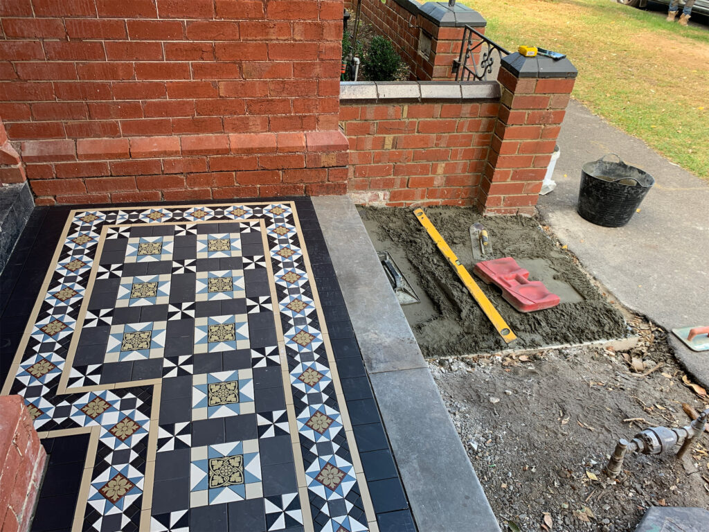 Decorative tiled porch renovation
